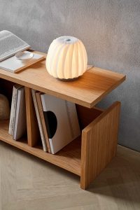 st906 table coated paper in bookcase close up light on